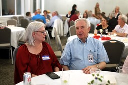 Bob Burkett , Janel Martignoni (John)